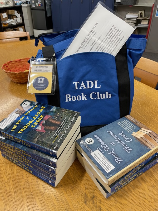 backpack with two stacks of books