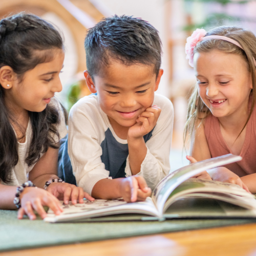 Children sharing a book