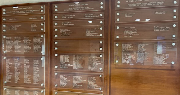 wood wall panels with names in white