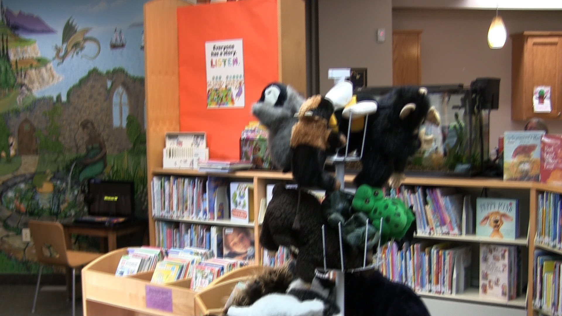 Childrens area with books and stuffed animals