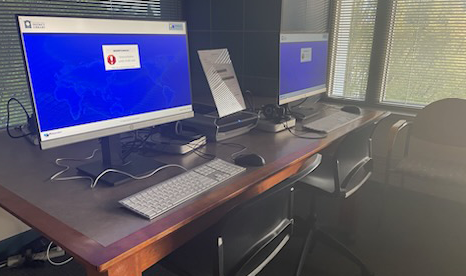 Two computers on a desk