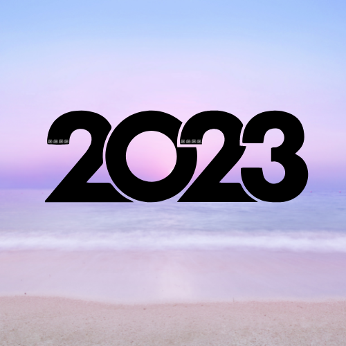 Sunrise over the water at the beach with 2023