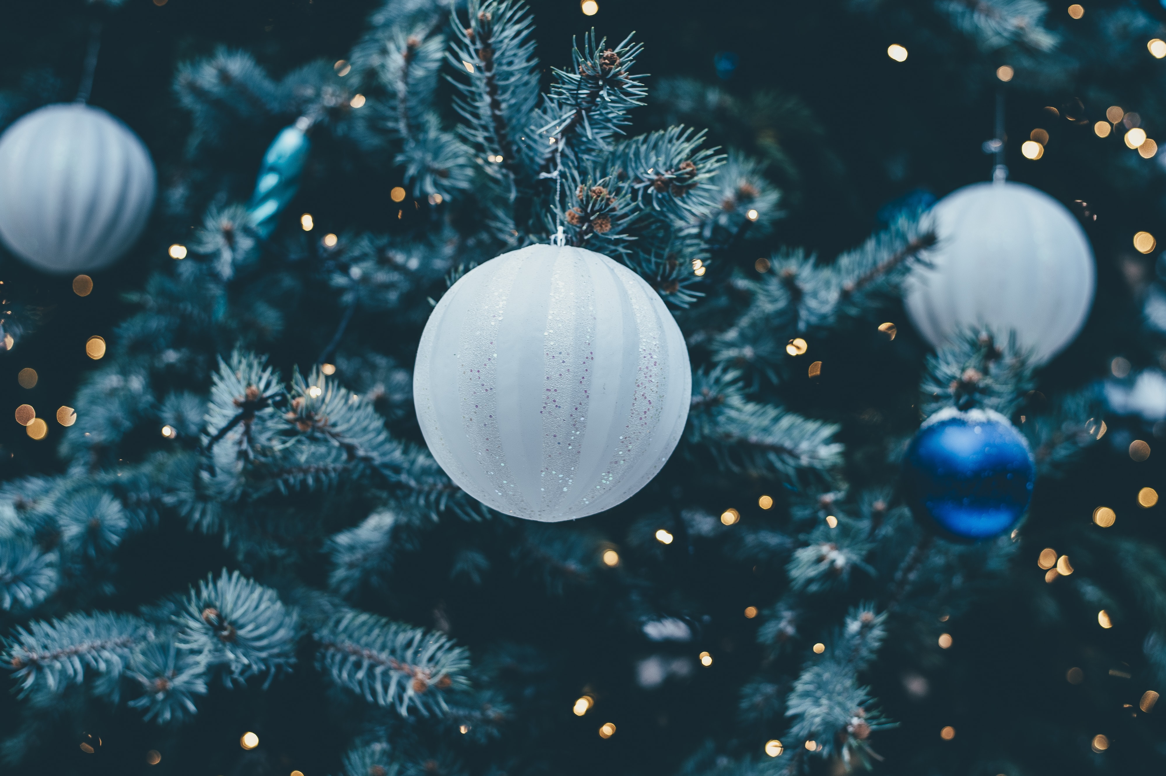 Christmas tree with white ornaments and light 