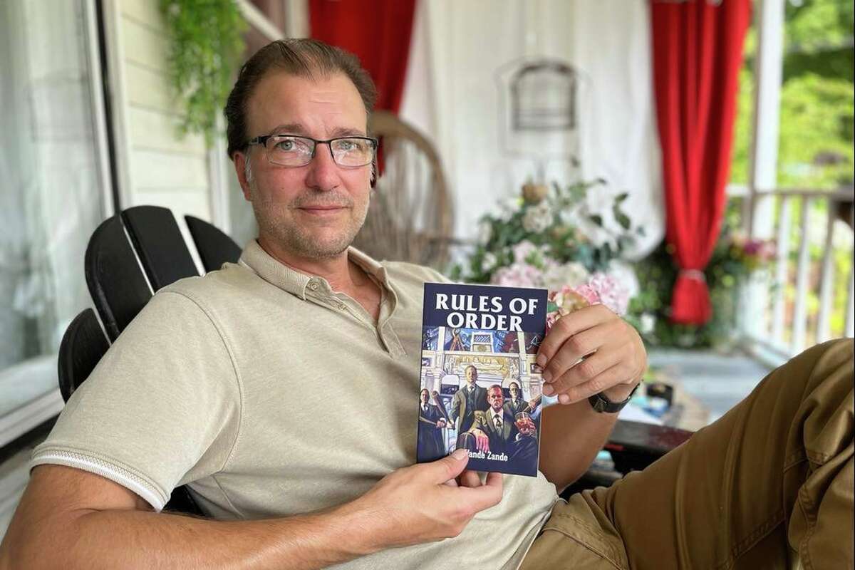 Photo of Jeff Vande Zande and his book.