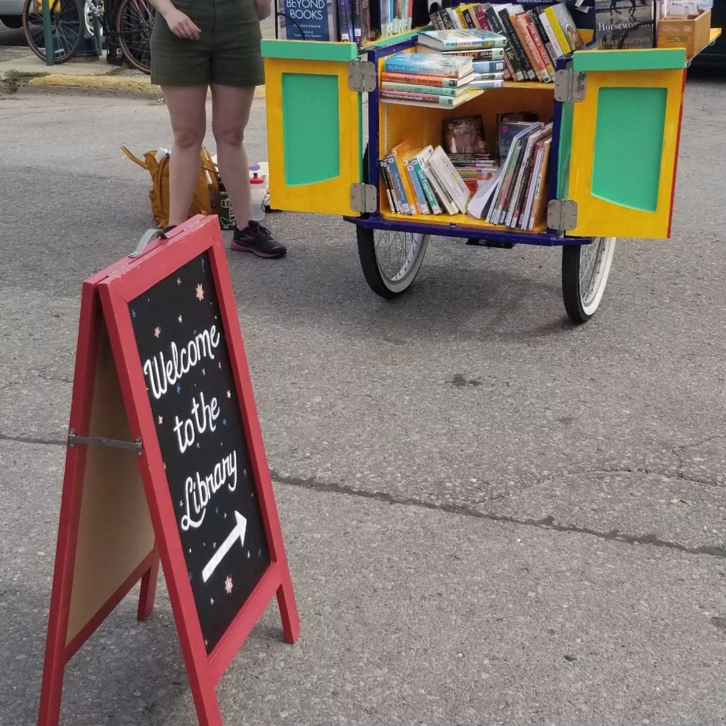 Book Bike with welcome to the library sign