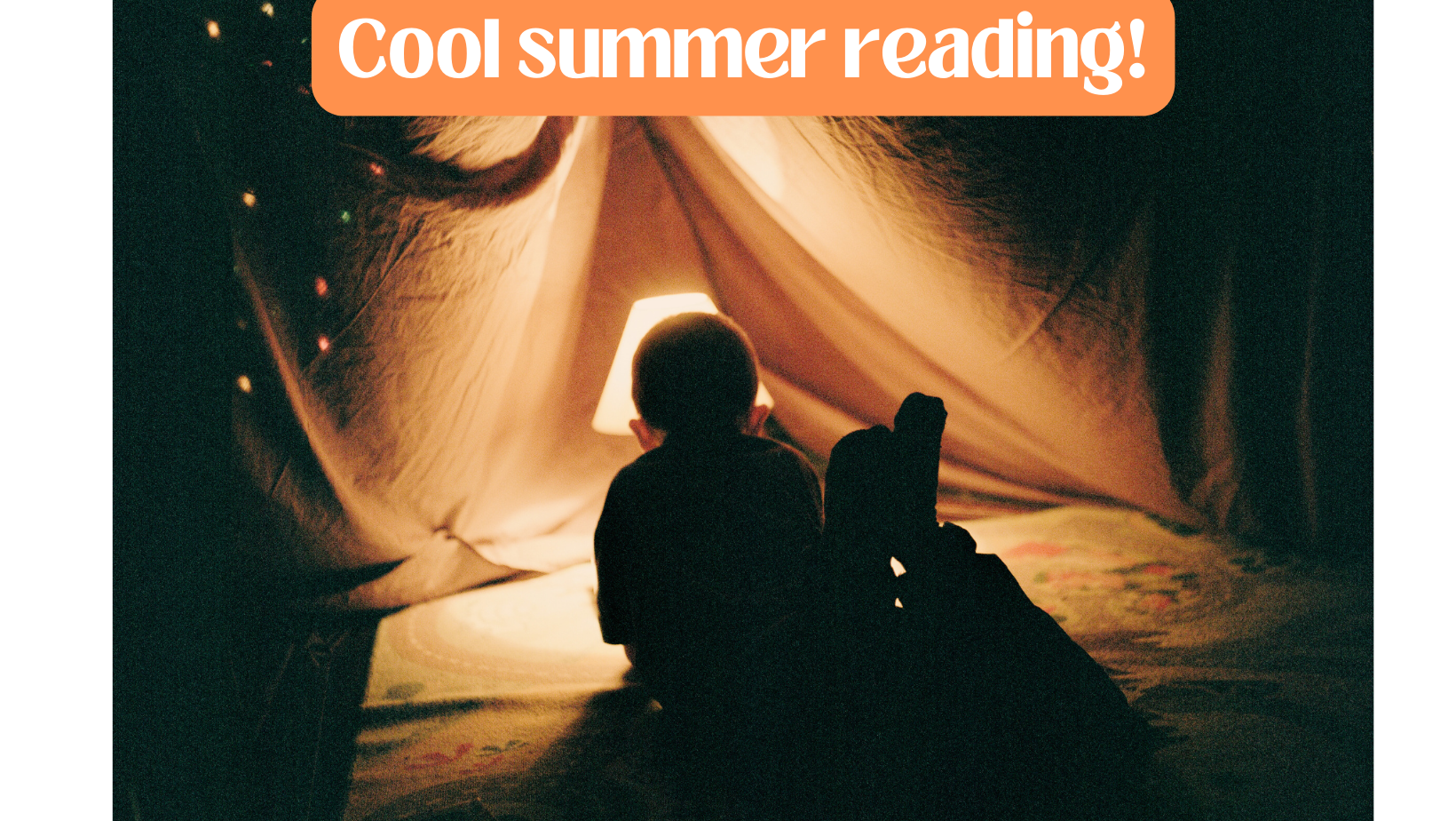 Child reading in tent at night