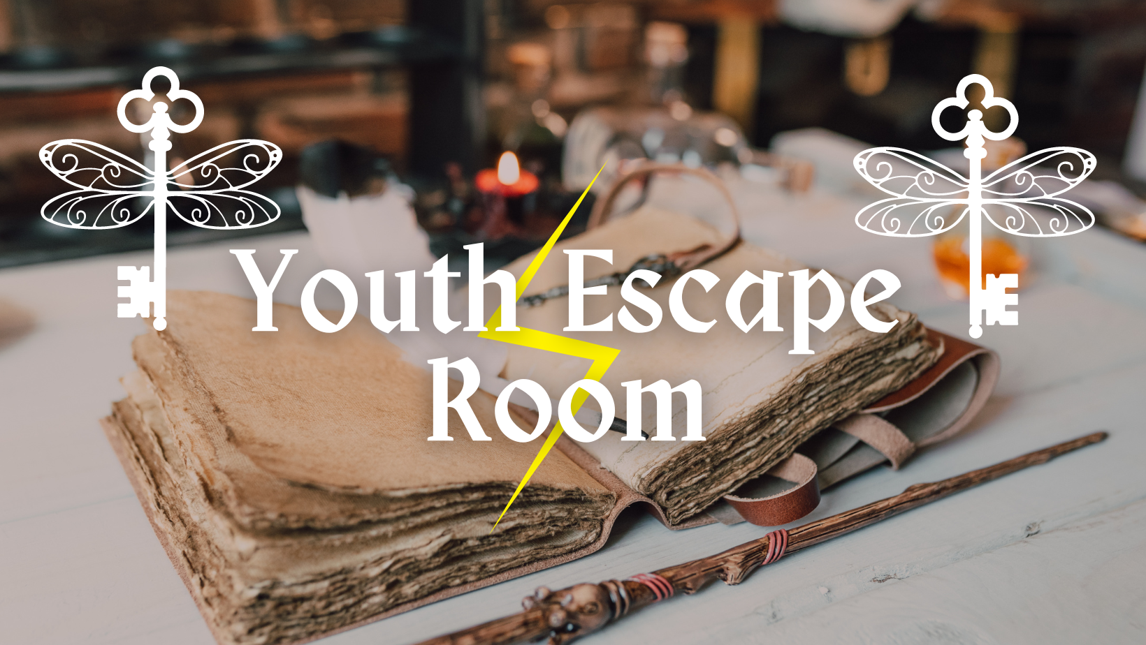 Youth Escape Room spellbook and wand on table