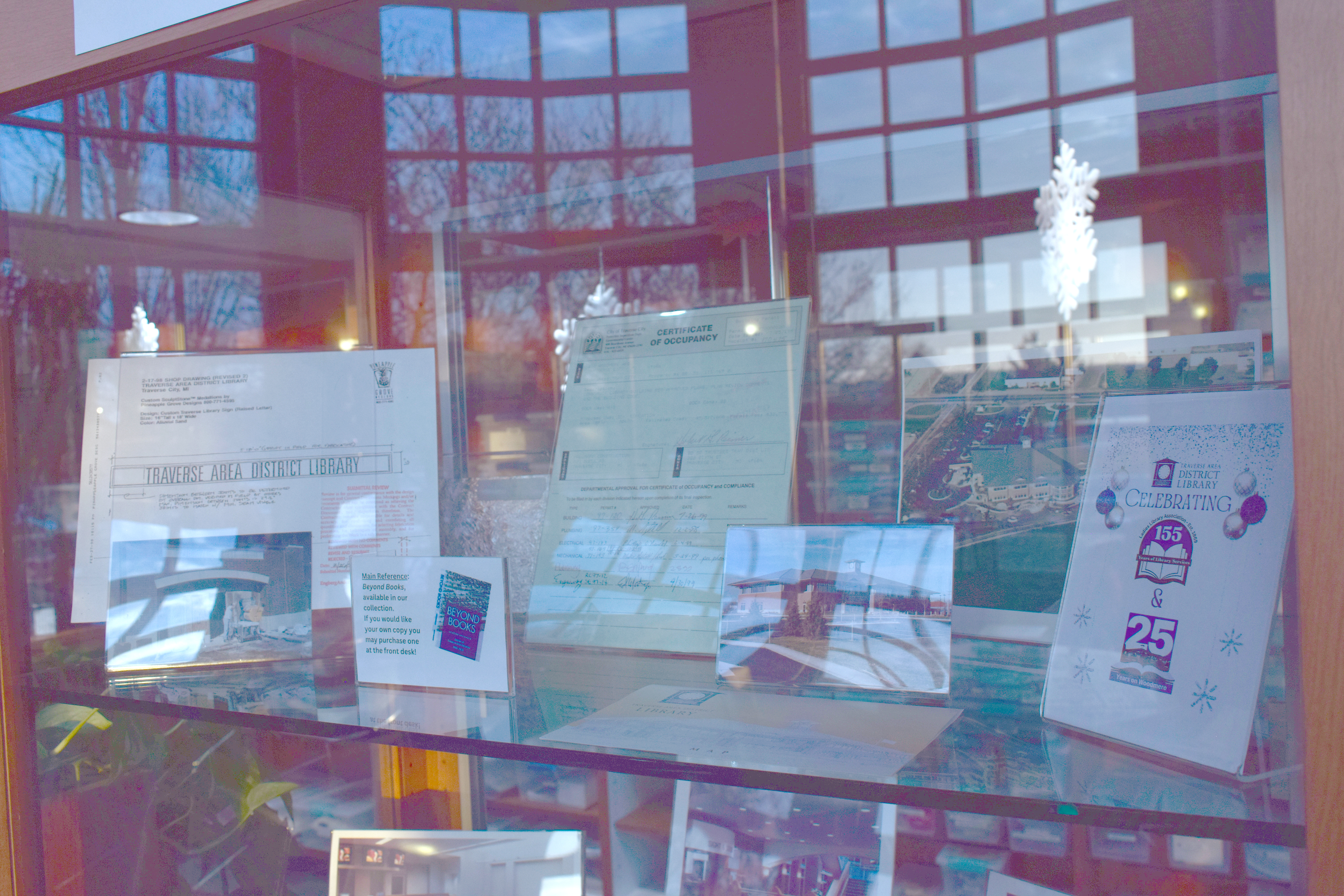 Stone name plaque, certificate of occupancy, photos