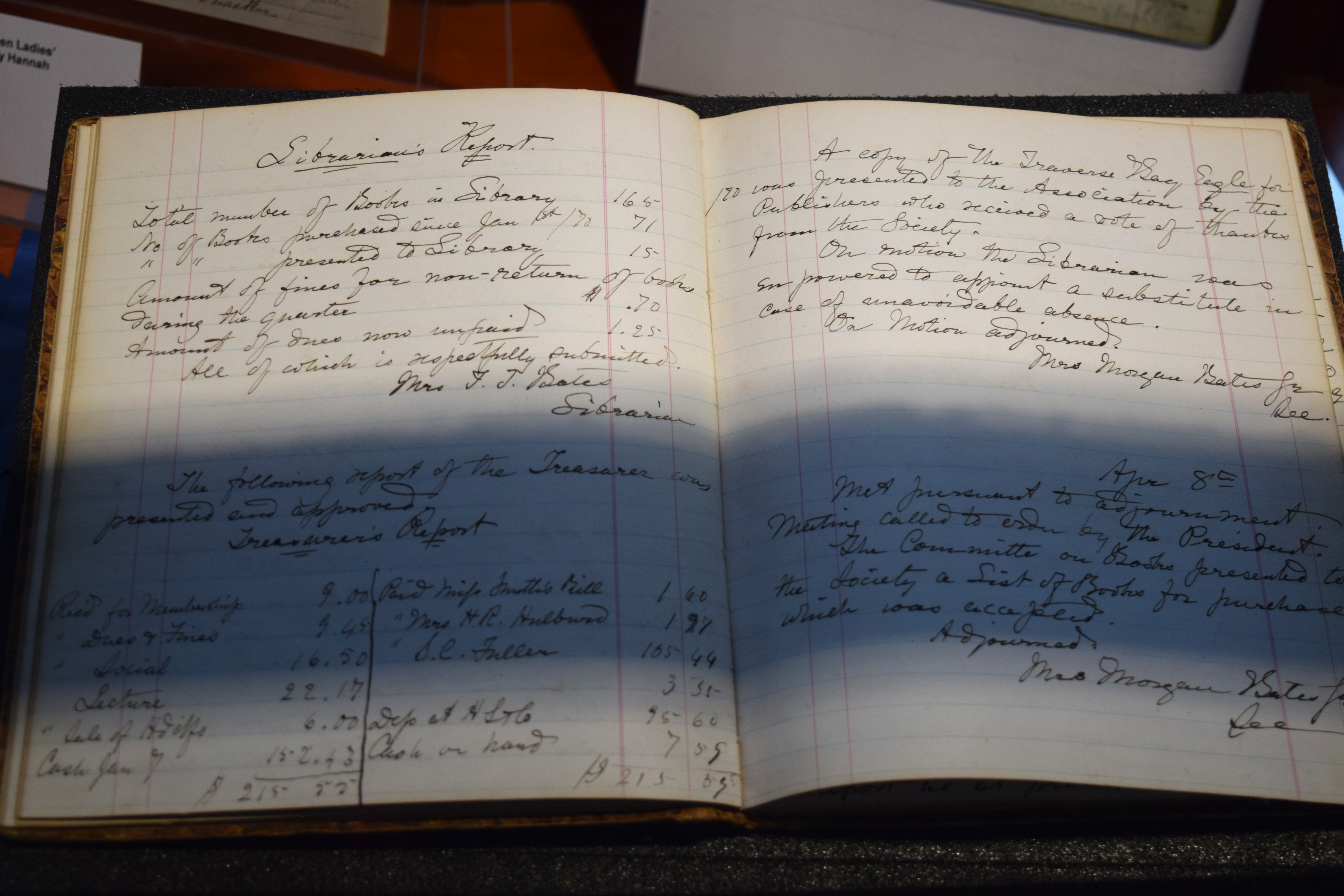 Open ledger to show handwritten entries