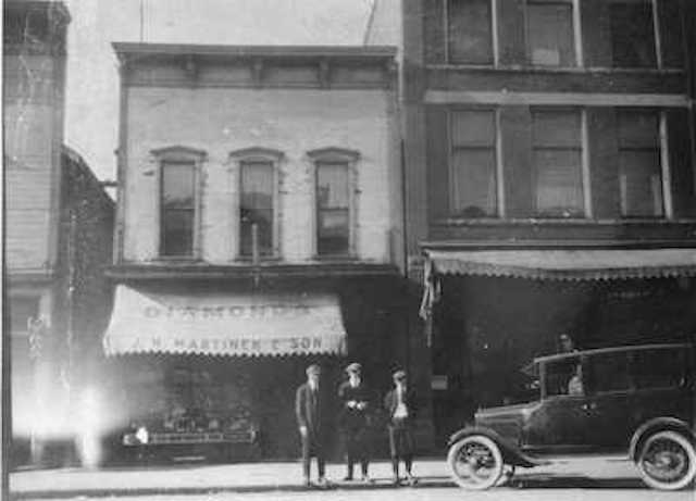 Photograph of the Martinek's Store front at 217 E. Front street.