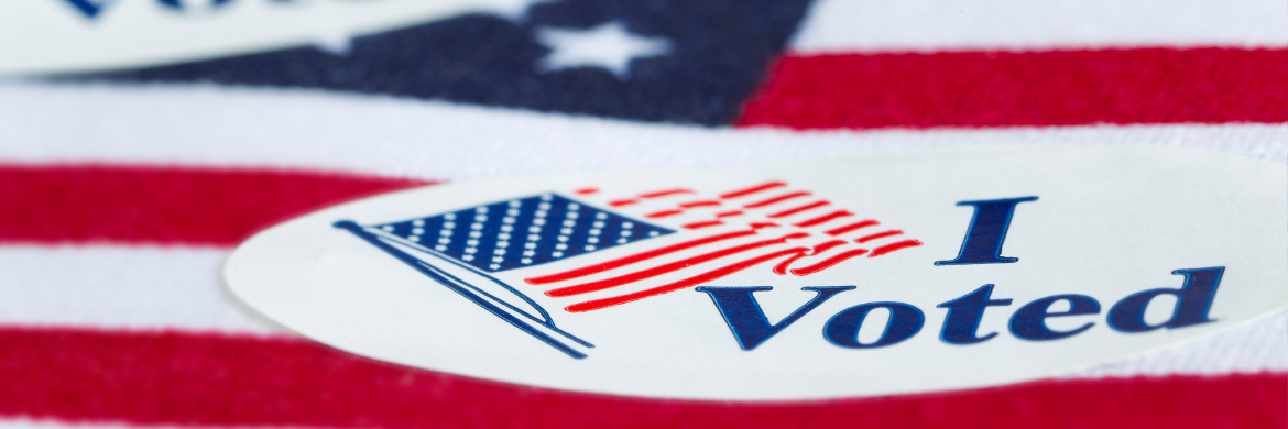 An I Voted sticker with a US flag