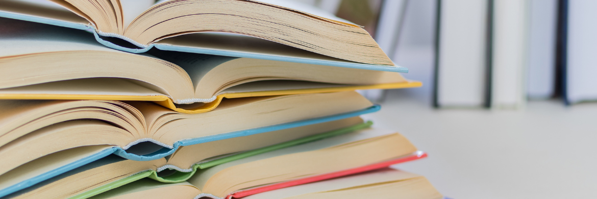 stack of open books