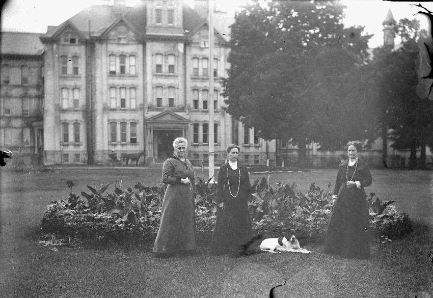 people with dog at State Hospital