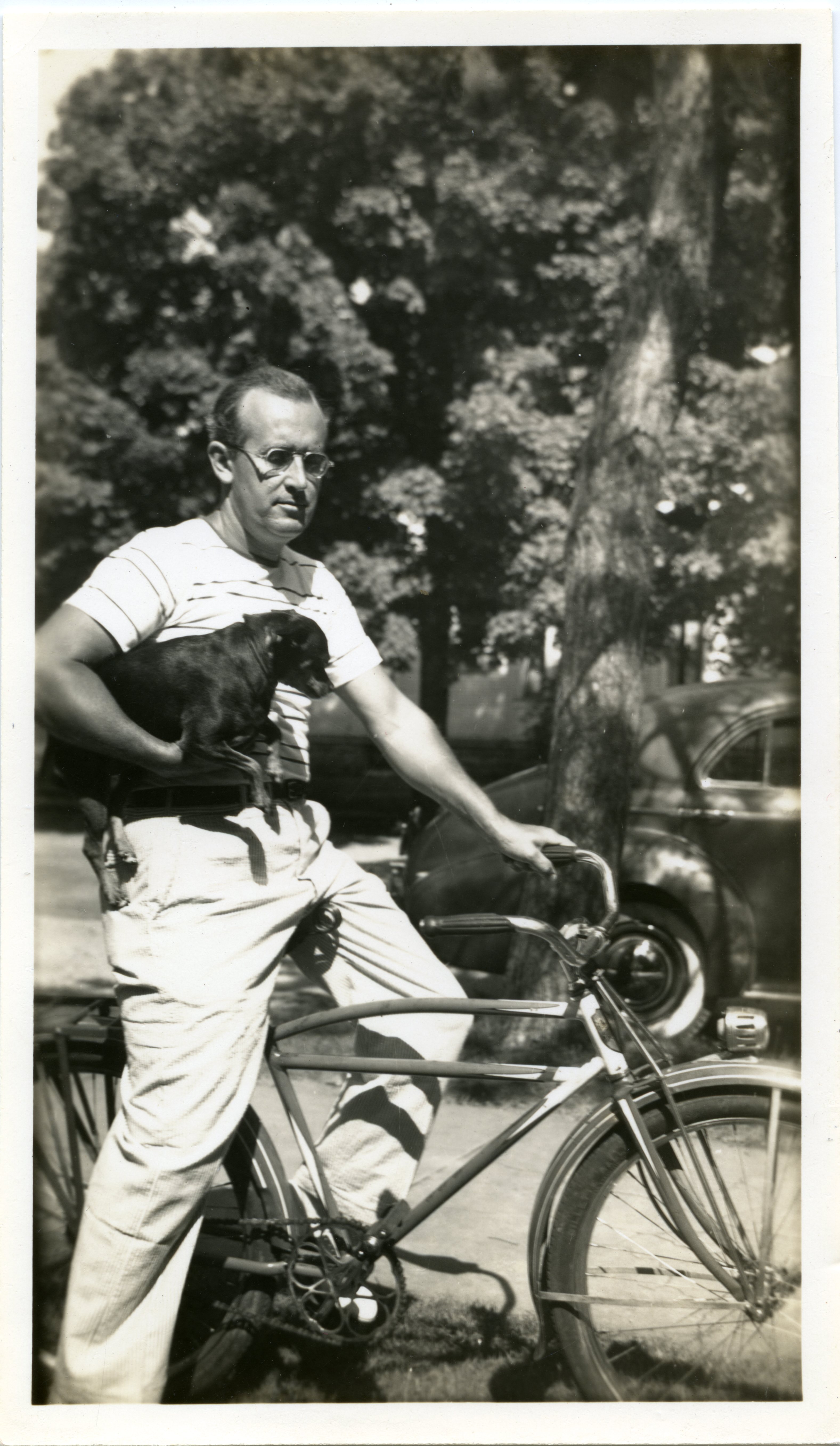 Person on Bike with Dog