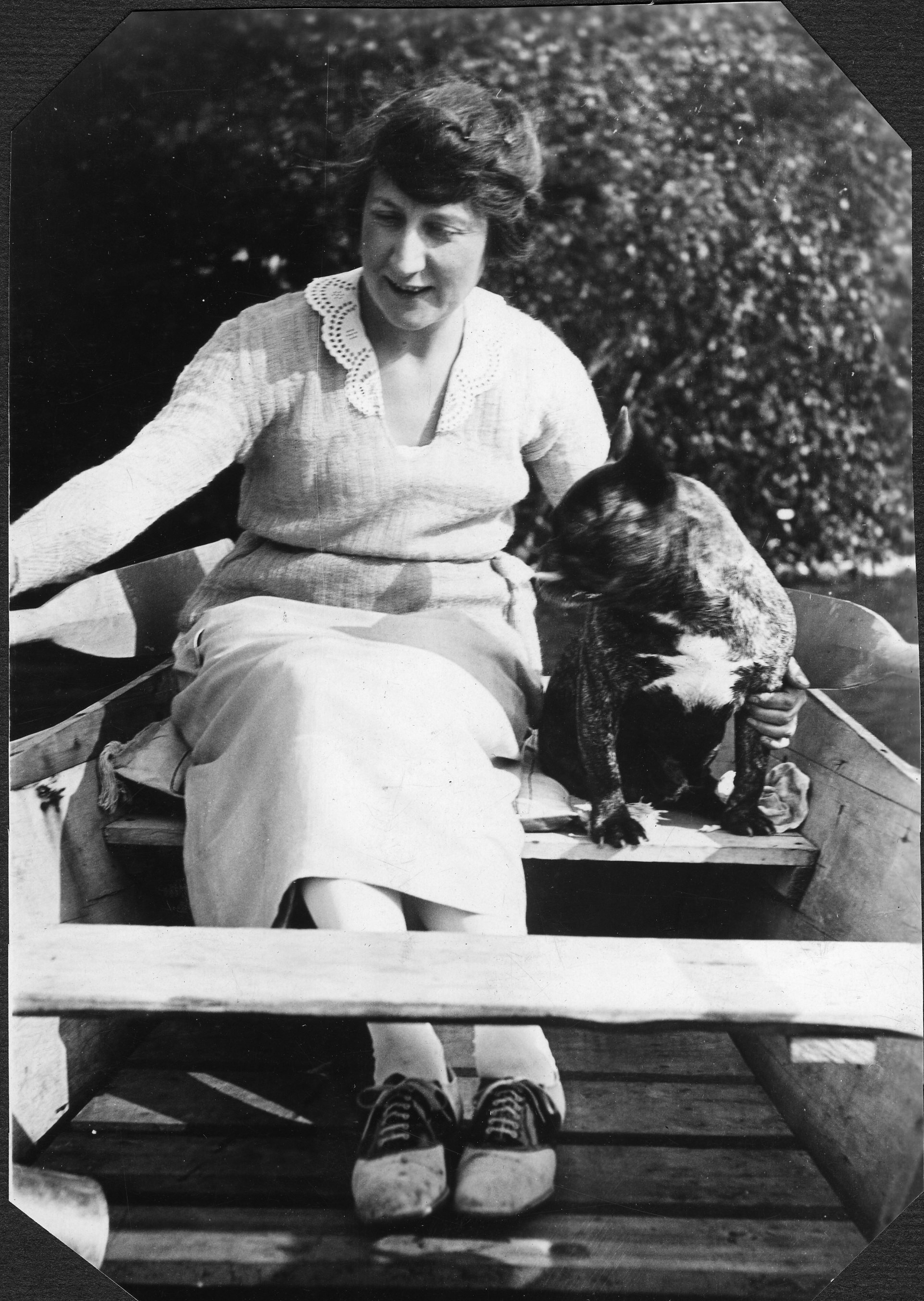 Dog and person in boat