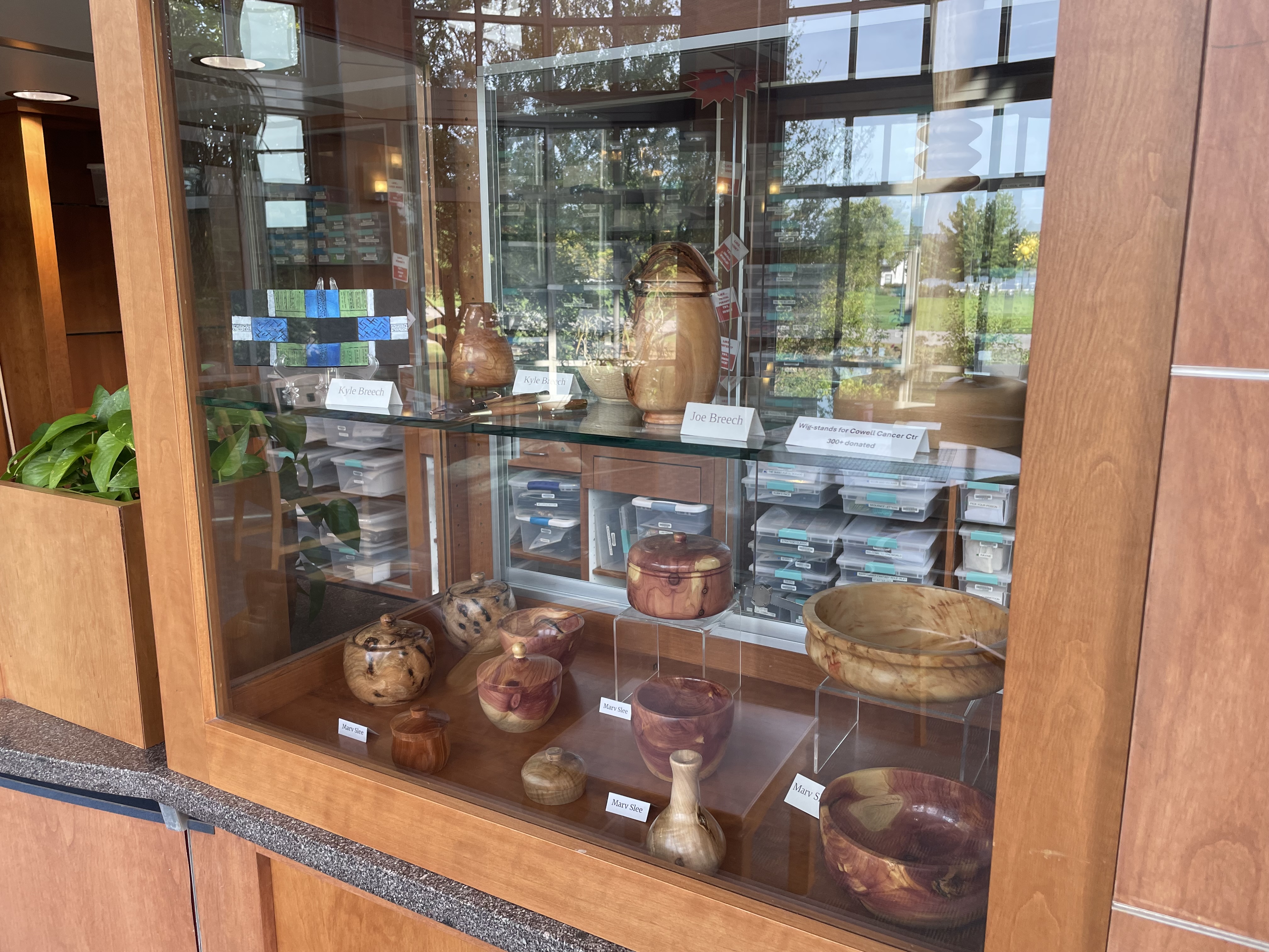 display case of turned wood items