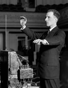 Leon Theremin is performing with the theremin, his electronic music device