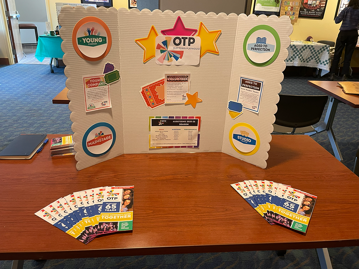 table with colorful stars and theatre info