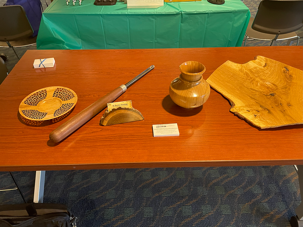 table with glossy turned wood items
