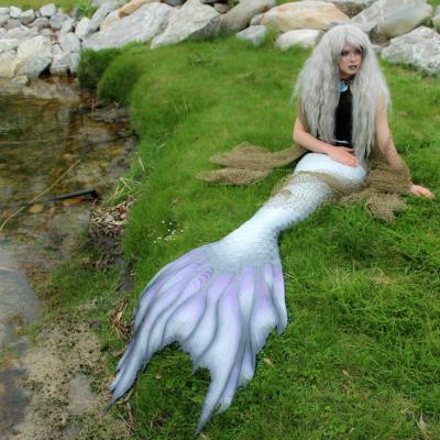 Mermaid with white hair and purple tail