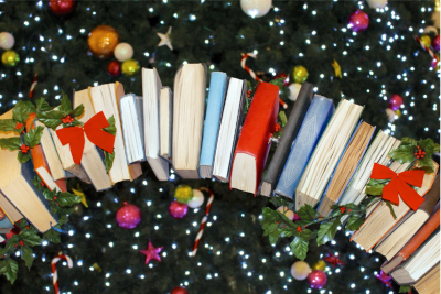 This is a picture of a book wreath with bows and stars.