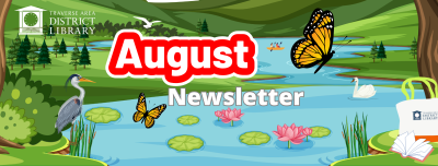 Pond with herons and a monarch butterfly