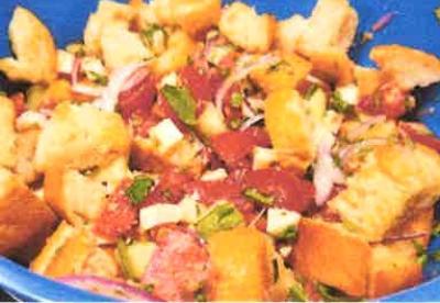 blue bowl filled with panzanella salad