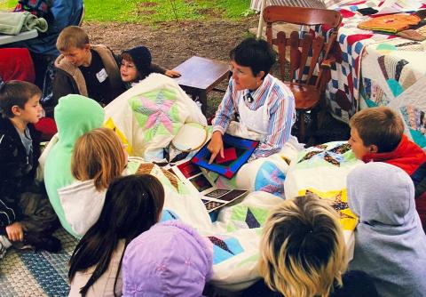 Nancy Bordine teaching young quilters.