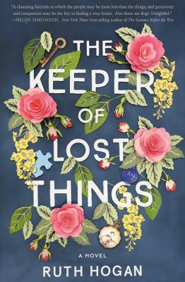 wreath of flowers with lost items including a button, a key, and a puzzle piece
