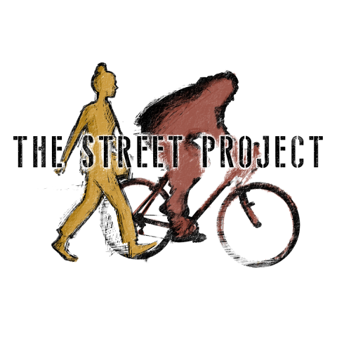 logo for The Street Project film, consists of two outlines of people, one walking and one riding a bike with the title of the film overlaid on top