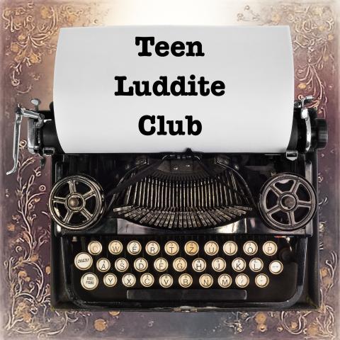 Antique typewriter with text "Teen Luddite Club" typed onto paper. 