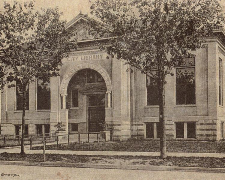 Sepia and black historical photo of the Carnegie Library, the original Sixth Street library location.