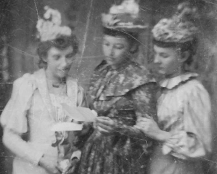 Three women reading a letter, early 1900s, believed to be from Kingsley MI