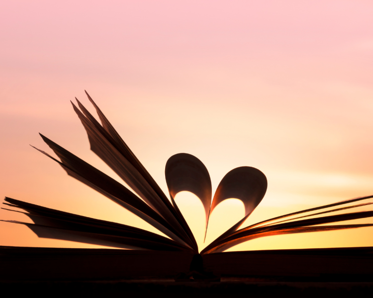 Open book with pages formed into a heart