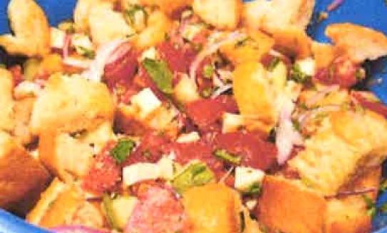 blue bowl filled with panzanella salad