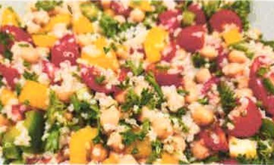 plate filled with quinoa salad with chickpeas