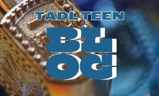 Header with a gold dreidel and blue ribbons. Blue and white text in the center reads: TADL Teen Blog.